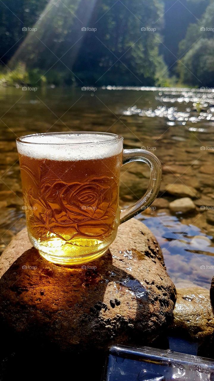 beer by the mountain river