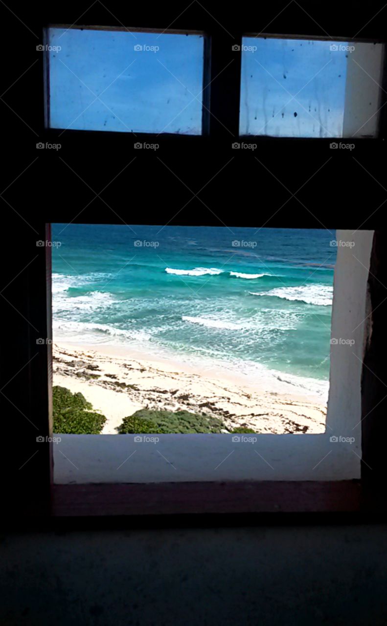 Caribbean sea view from mexican lighthouse windows