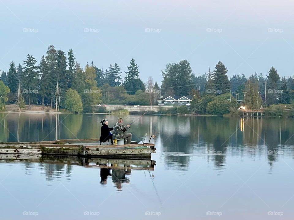 Evening family fishing at the lake