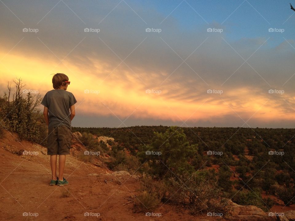 Desert gold . A boy enjoying the magic of the desert 
