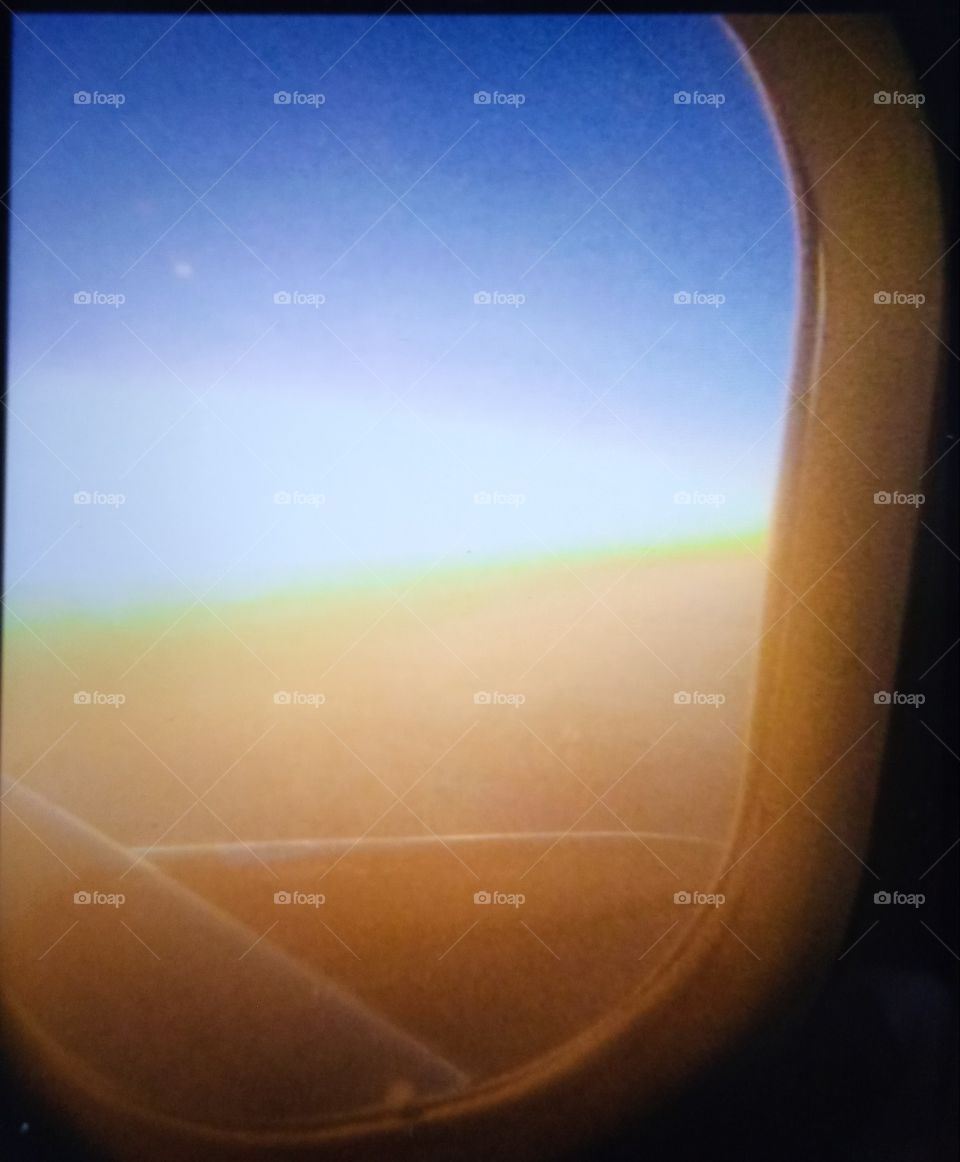 Visão de uma janela de um avião