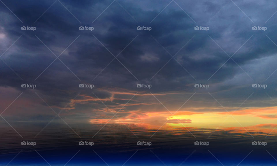 Clouds kissing the Sea