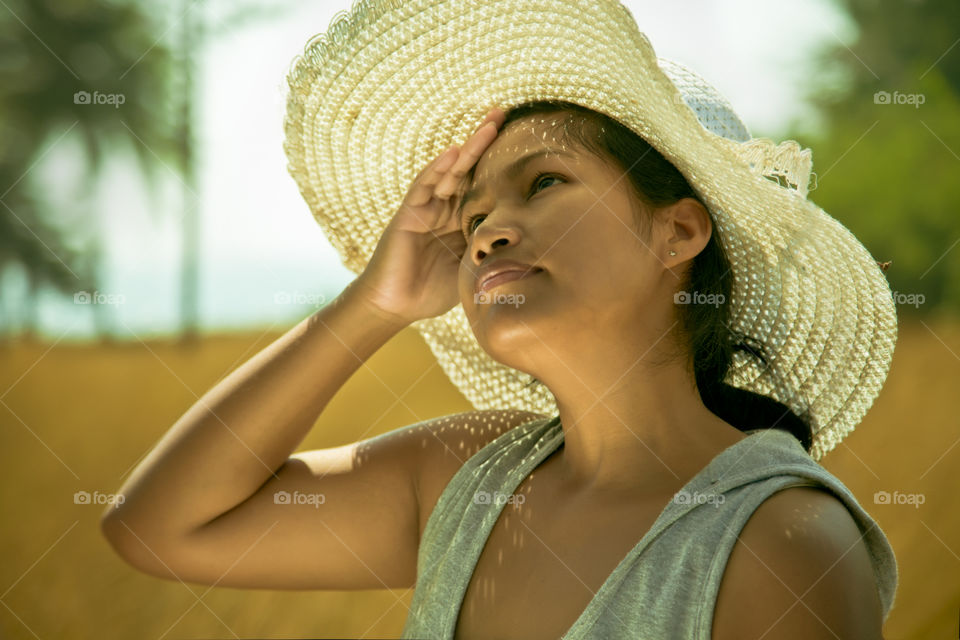 lady out on the sun. asian woman enjoying spring