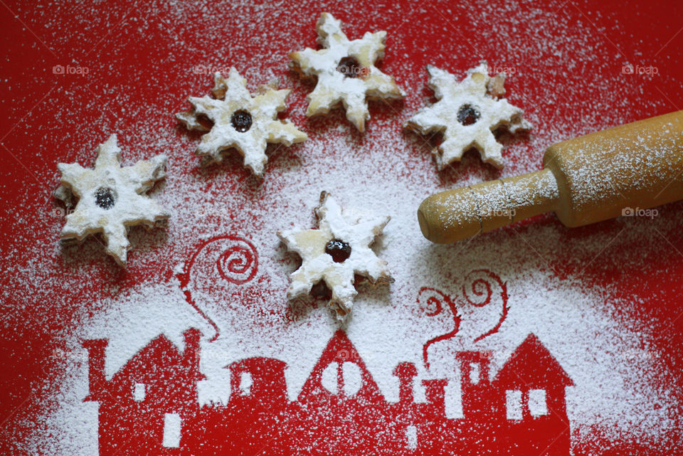 Home made Christmas cookies, powdered sugar decoration