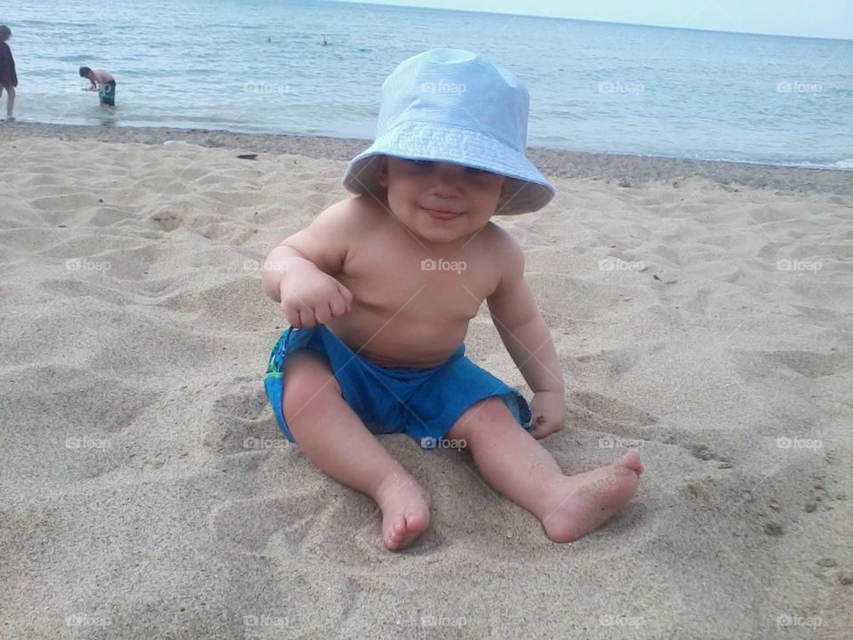 Playing at the Beach. First year at the beach