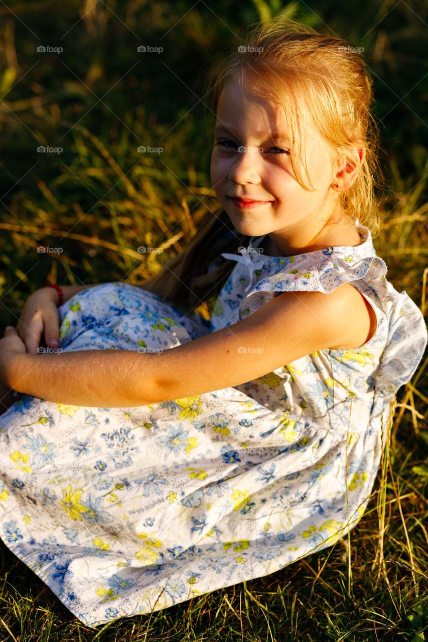 little girl on the sunset light