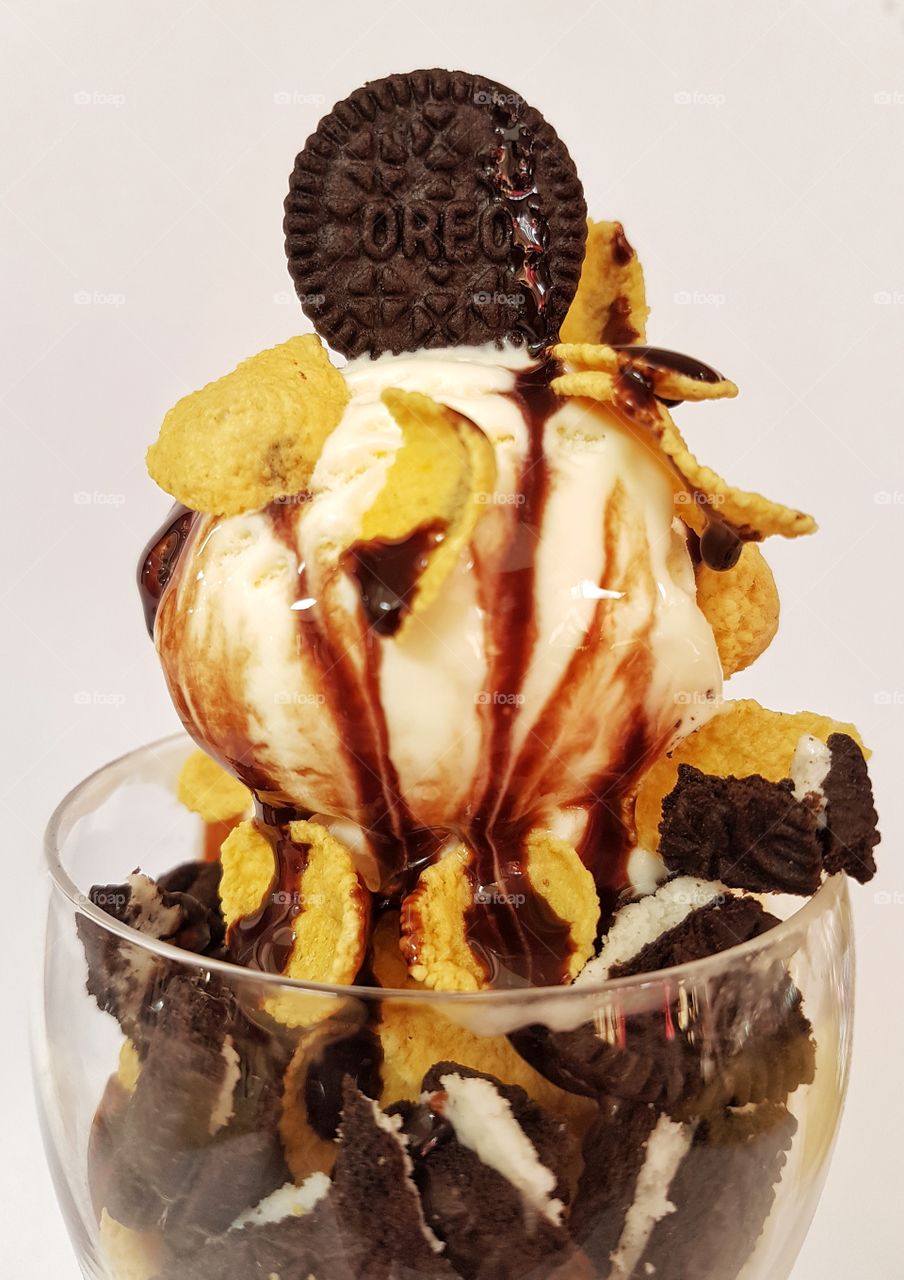 vanilla ice cream with oreos, crispies and chocolate syrup