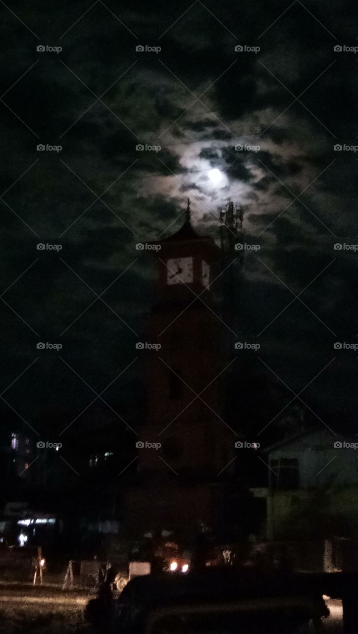 Evening clock tower Itanagar under moon