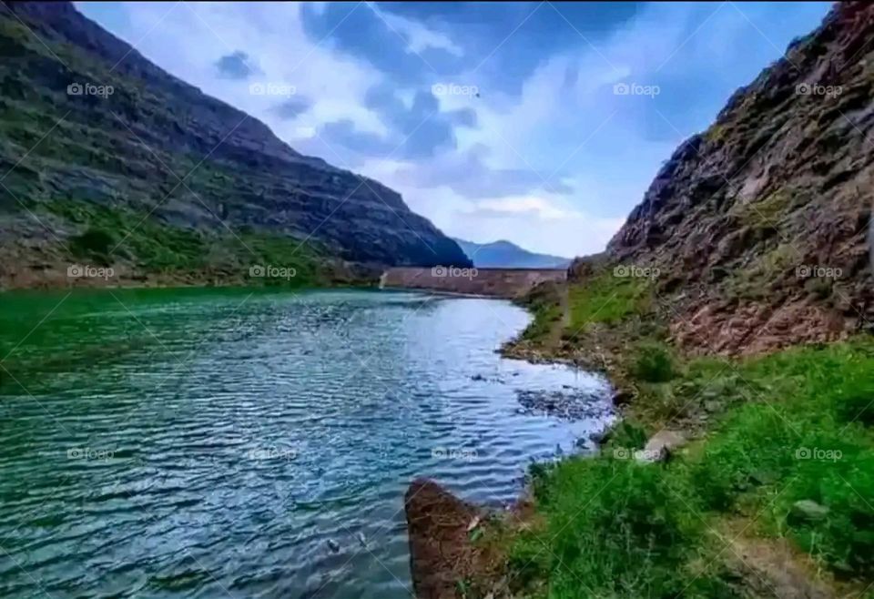 Glory be to God, the magnificent and picturesque view and the natural green trees are a view that is nothing more wonderful than it