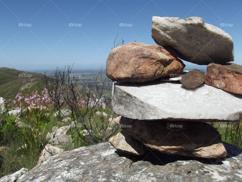 Rocks stacked on top of one another on nature