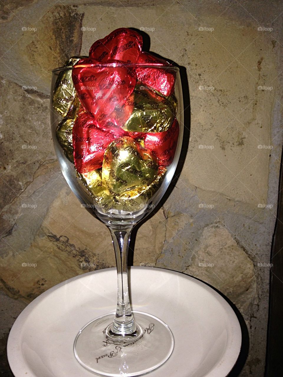 Wine glass filled with candy