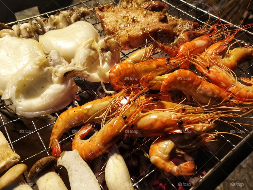 Seafood grilled with charcoal stove.