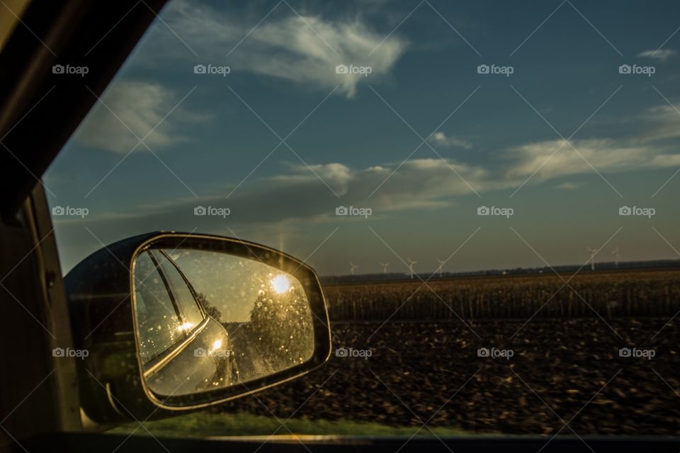 Beautiful reflection in the side mirror of a car