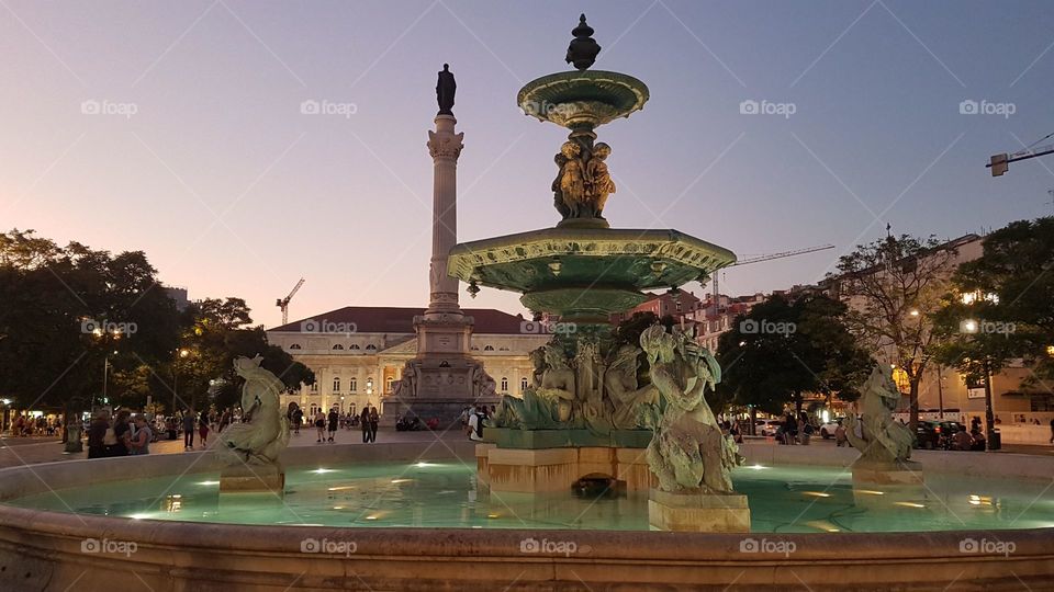 Majestic fountain in Praça Dom Pedro IV at Lisbon, Portugal.