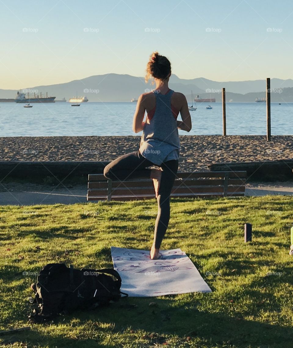 Relaxing beach yoga as the sun disappears. 