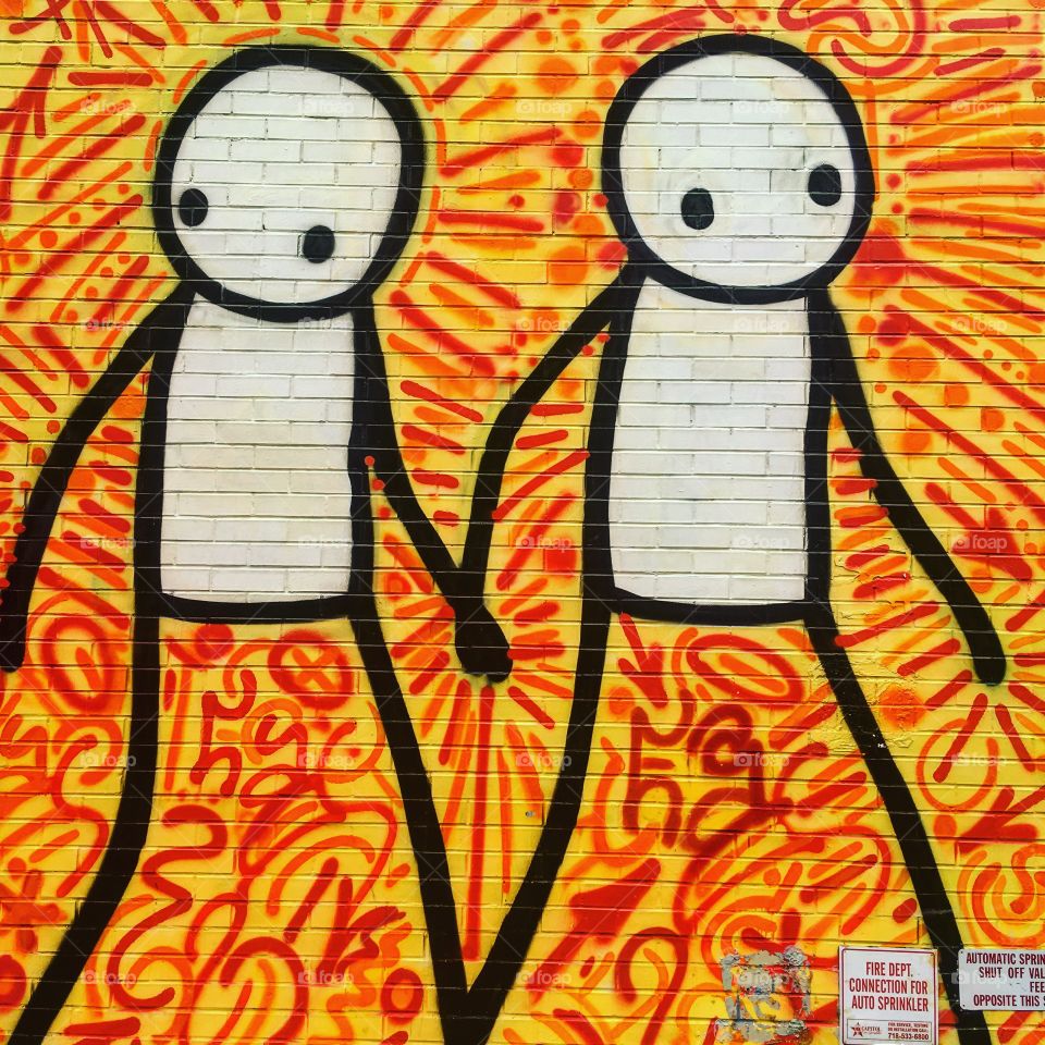 Graffiti in NYC of a couple 
