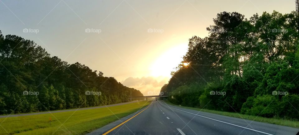 sunset on roadtrip interstate