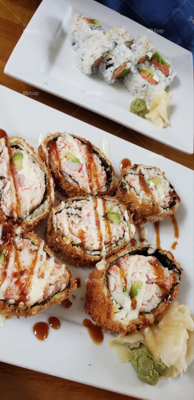 Delicious deep fried sushi with Philly Roll in focus