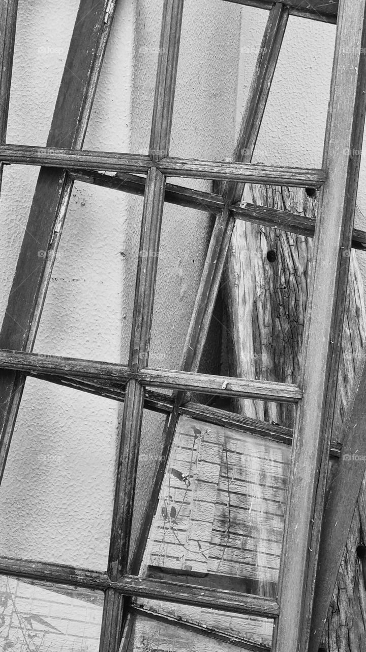 black and white image of wooden window frames