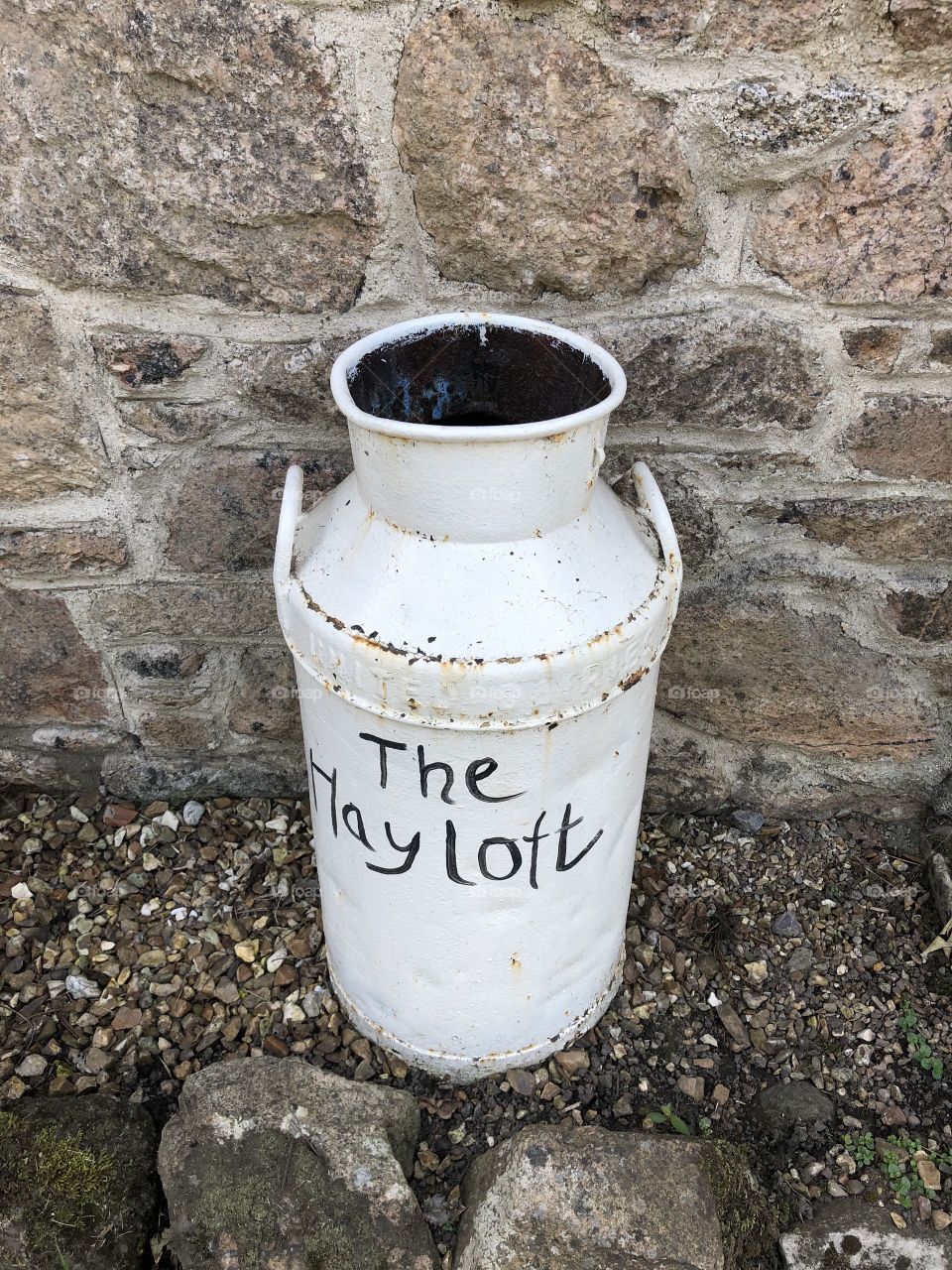 I love the authenticity of this sturdy milk churn, that still looks impressive, despite its longevity.