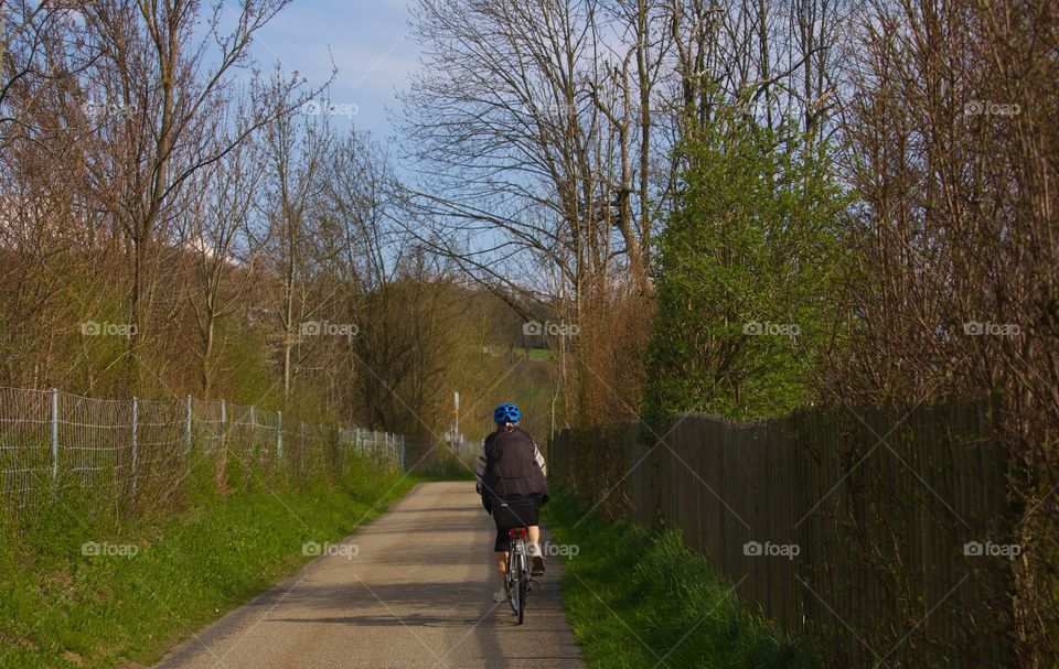 Woman On Bike From Behind