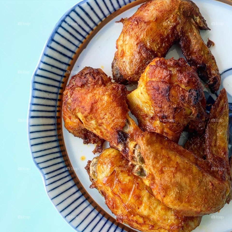 Ayam berempah with spices air fried to perfection 