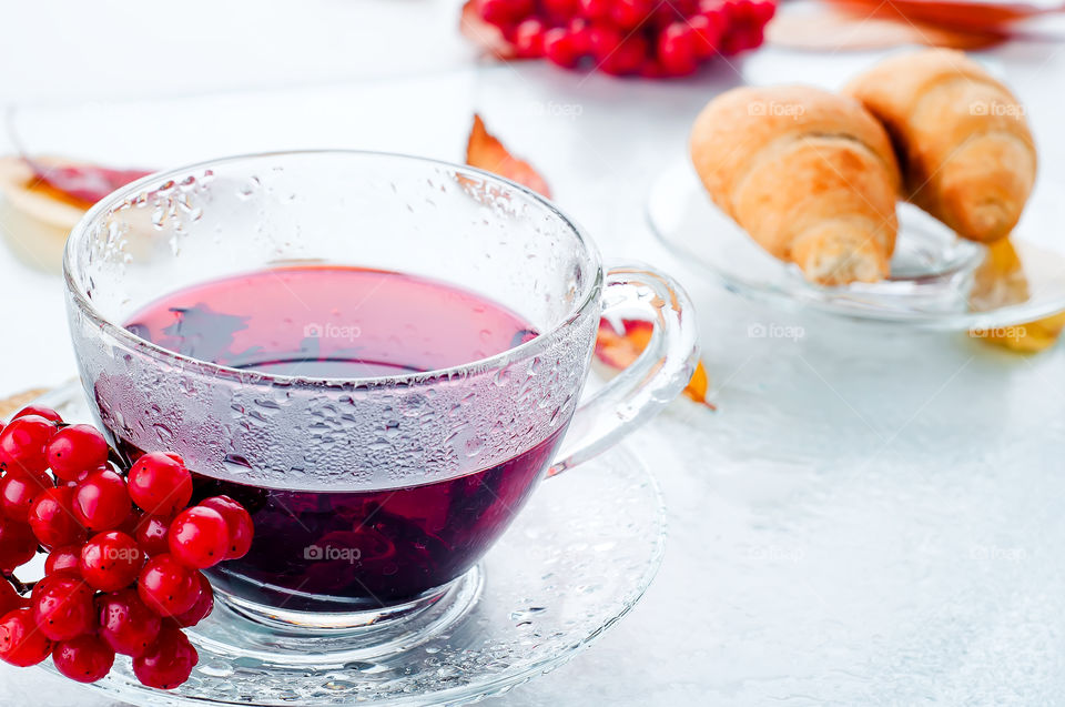Close-up of cherry with herbal tea