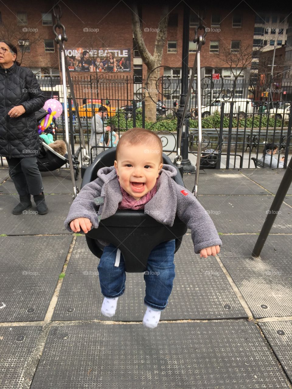 Baby boy on a swing 