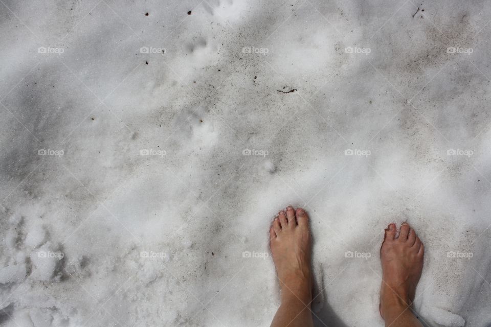 Vacation in Austria. Summer snow in the Alps. The temperature was around 30 dejter celsius but the snow was very cold. I 
had to put on my shoes.