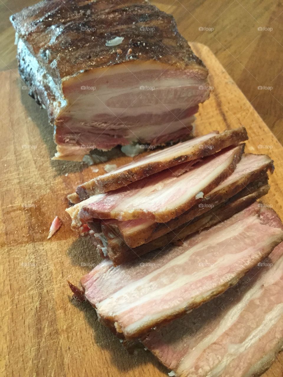 A separate smoked pork, which can be bacon if cut into thin slices.