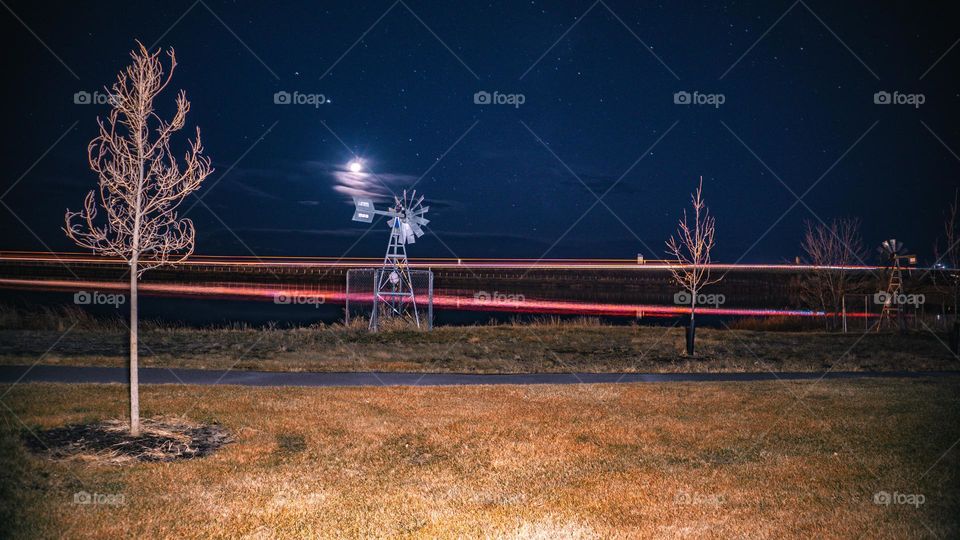 Long exposure of a highway over a lake.