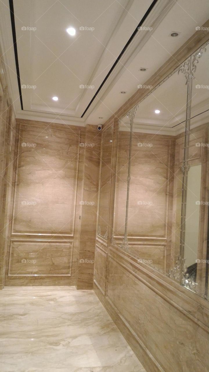 elevator lobby, elevator room.