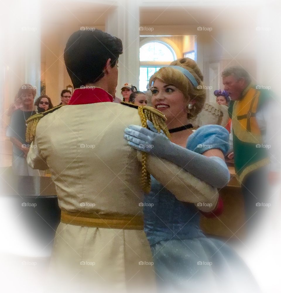 Cinderella dancing with Prince Charming in the lobby of the Grand Floridian in Orlando, Florida. 