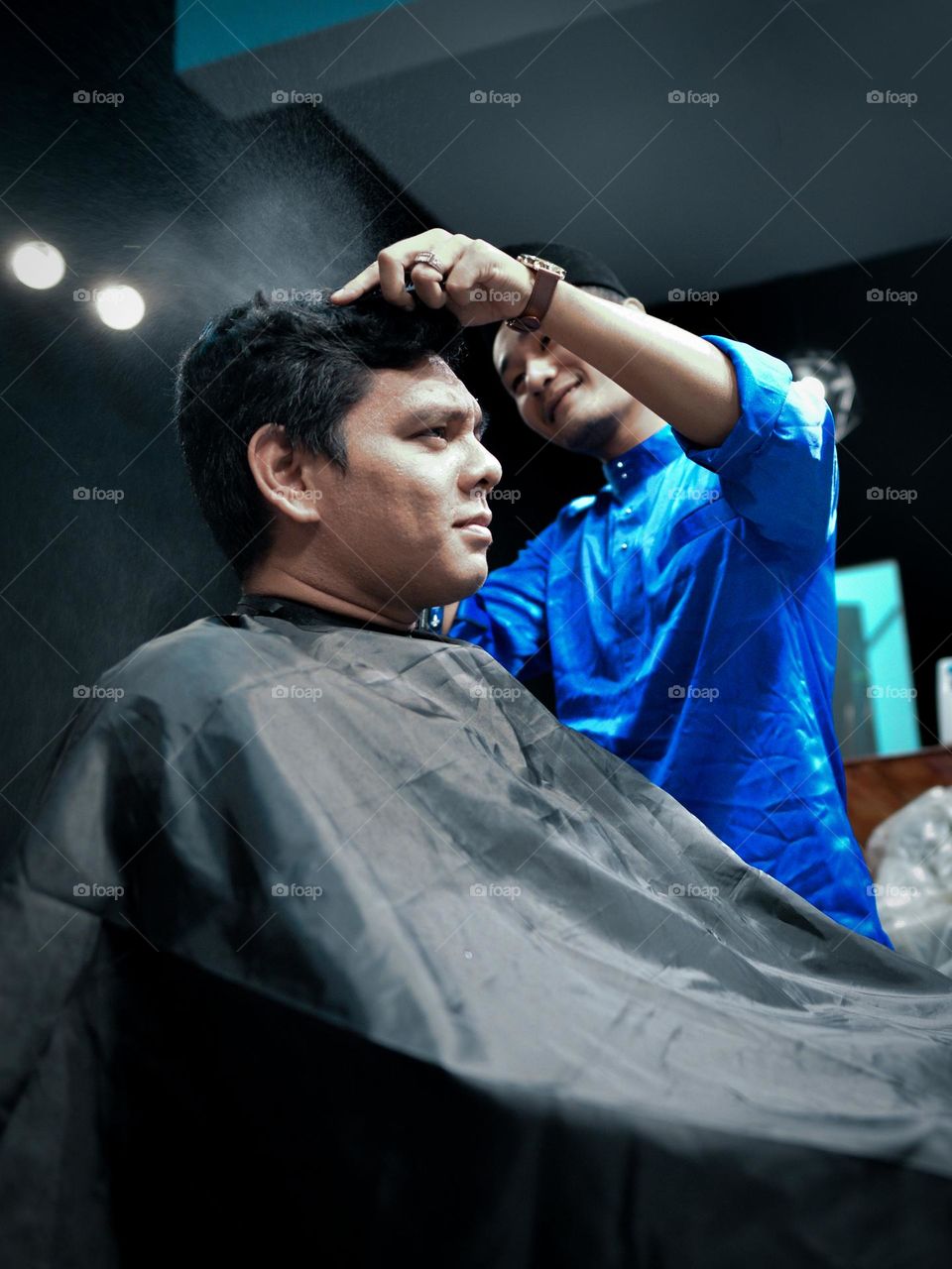 Having a haircut at a friend’s hair salon