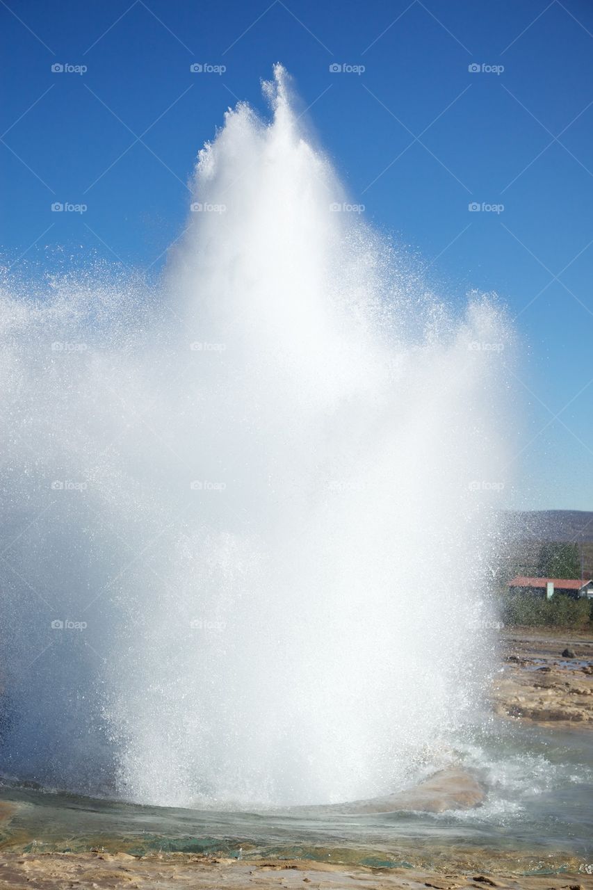 Hot spring against clear sky