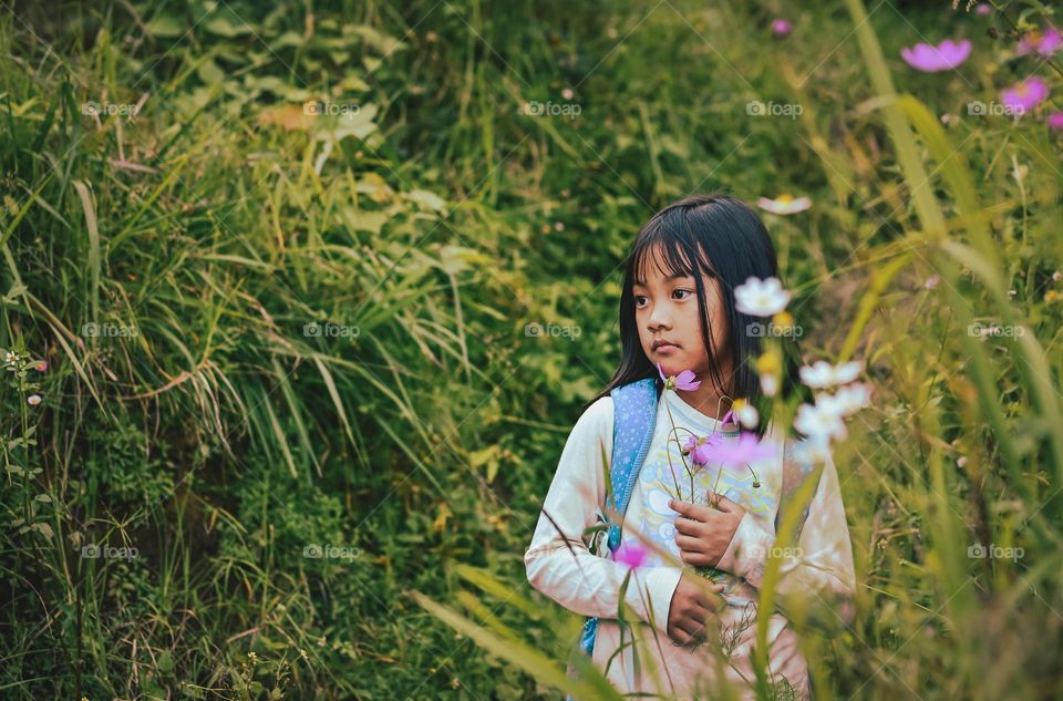 Portrait of a young girl in nature