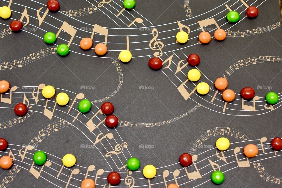 Sweet music, musical notes covered with candy