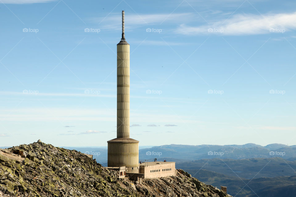 gaustatoppen. this construction sits on top of one of the highest mountains in norway.