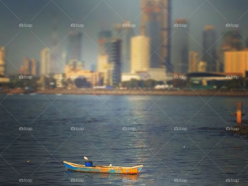 A Bird, An Empty Boat and A Beautiful City Mumbai India.