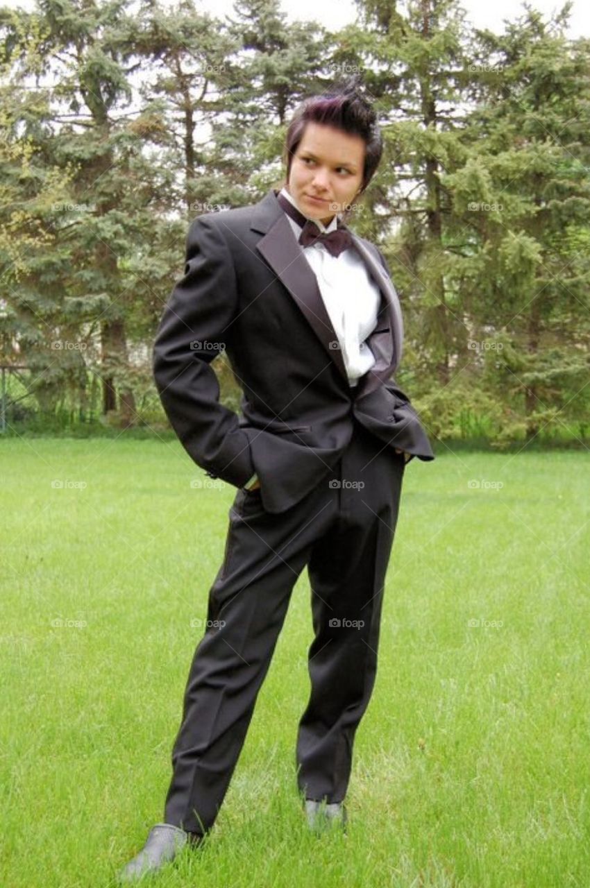 James James Bond. Female dressed in tux for high school prom.