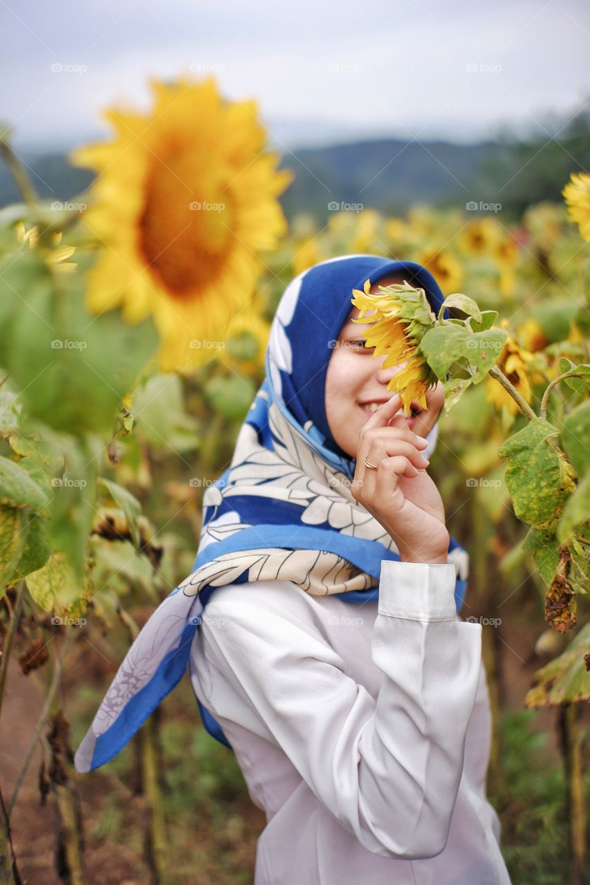 beautiful woman in the flower garden during spring