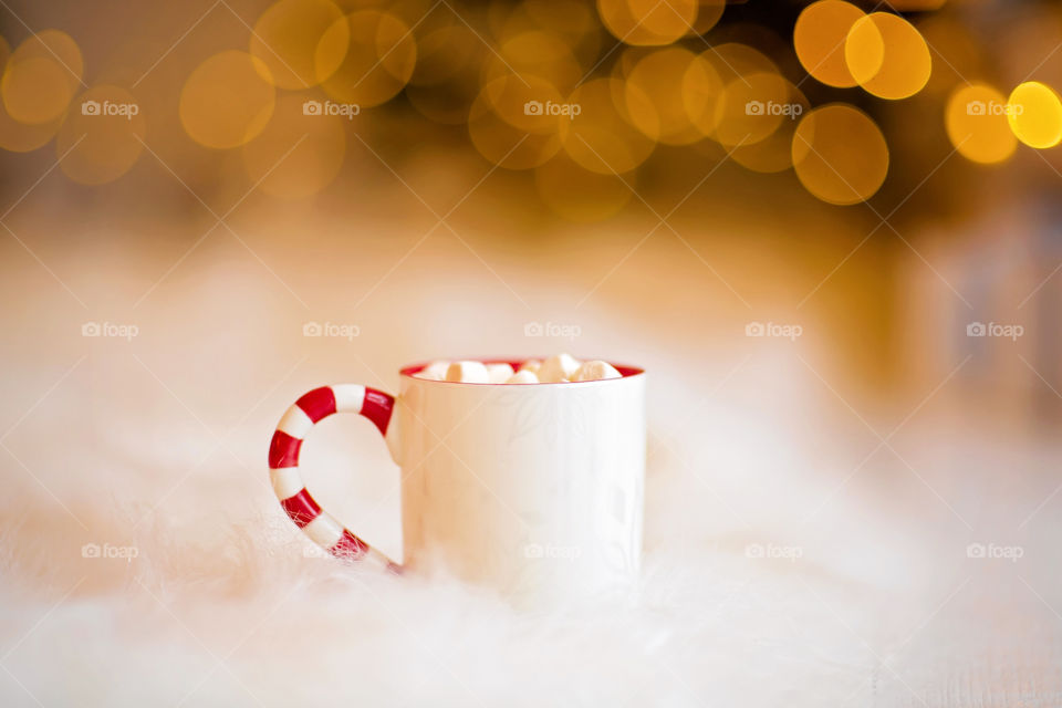 cup of coffee in a cozy festive Christmas atmosphere