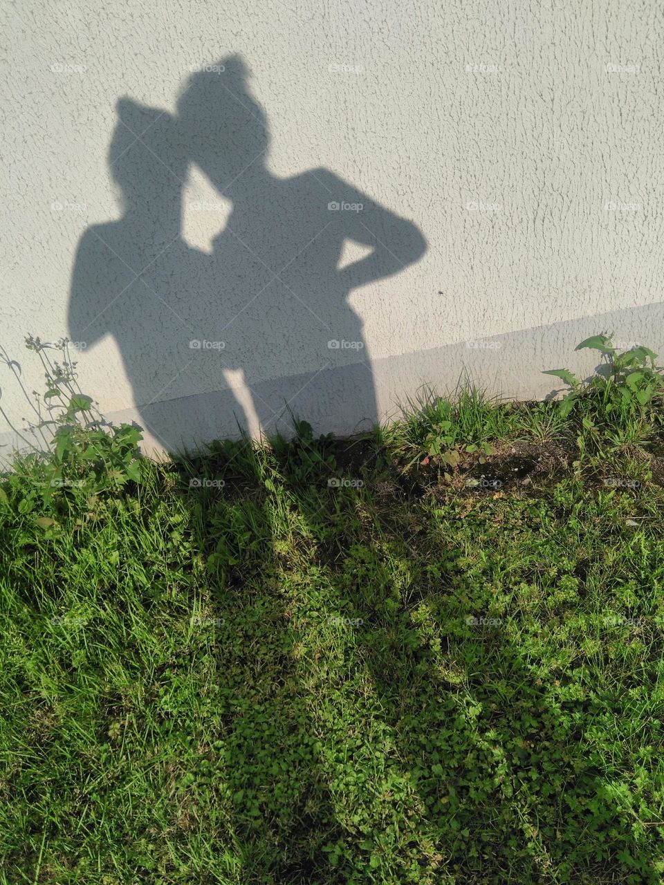 two woman's shadows, female friends