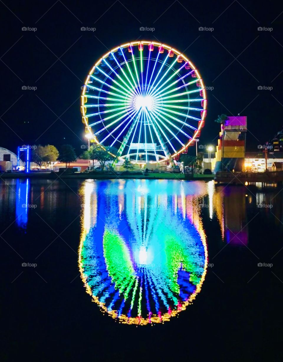 Ferris Wheel Blue and Green Reflections In the water