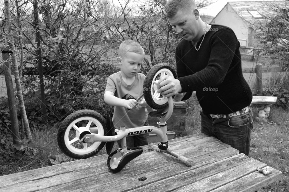 fixing my bike. daddy and me
