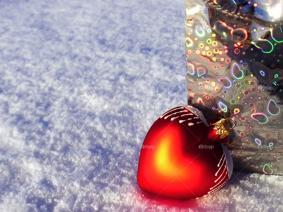 Christmas gift box and heart shaped decoration 