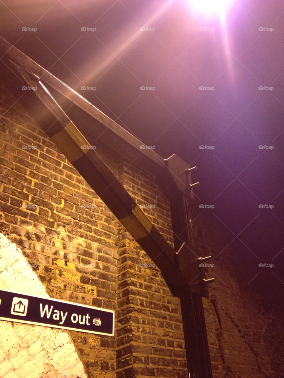 brentford station night bridge brick wall by capturedshutter