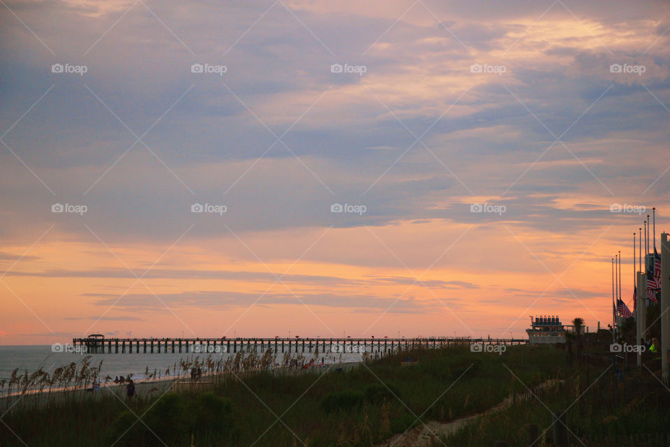 Myrtle Beach Boardwalk Sunset. sunset at the beach