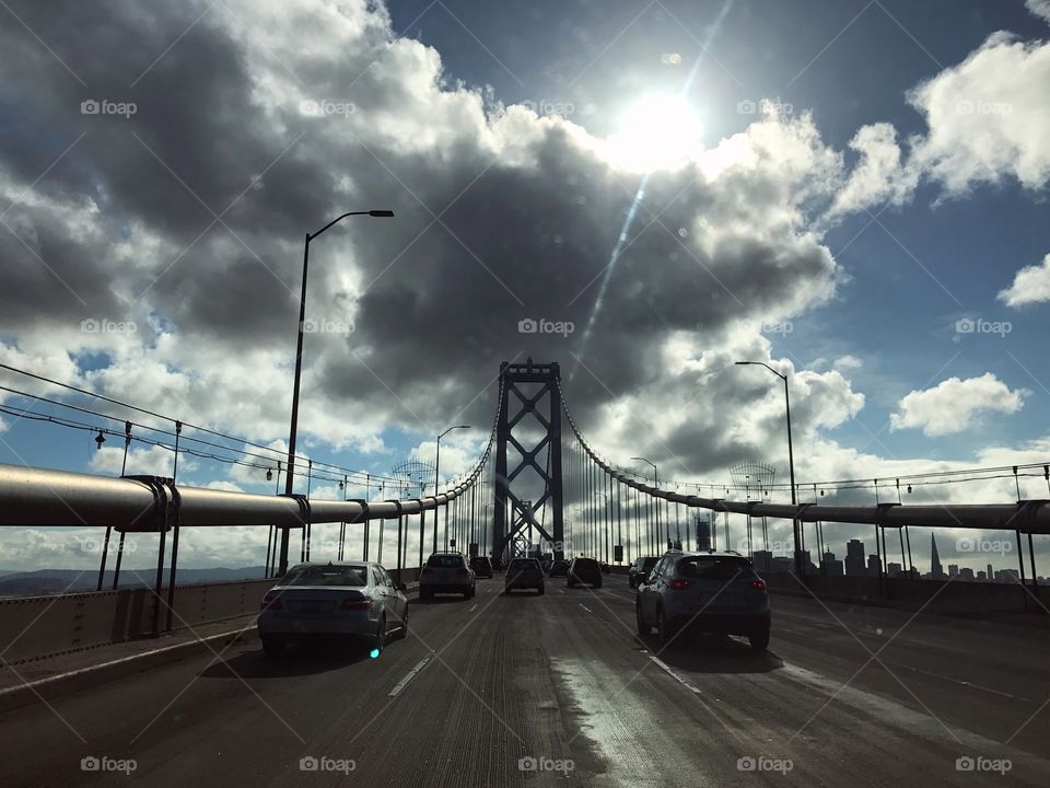 Bay bridge in storm clouds