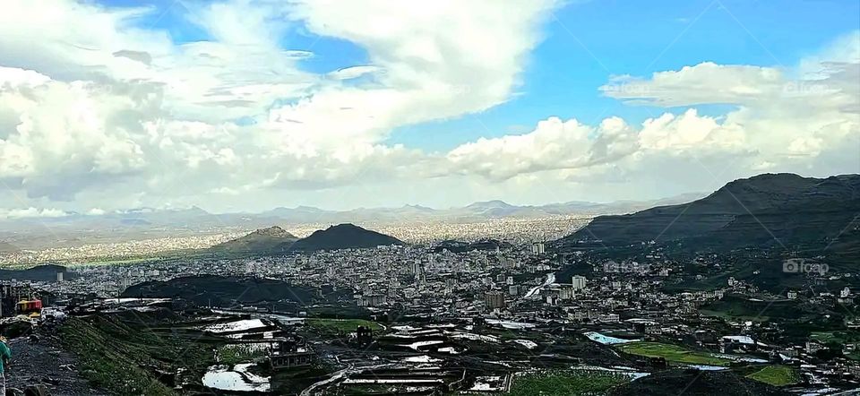 Glory be to God, the magnificent and picturesque view and the natural green trees are a view that is nothing more wonderful than it